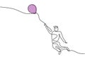 One continuous line drawing a teenager man holding balloon. Happy young boy playing air balloon in outdoors while dance and run Royalty Free Stock Photo