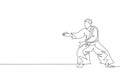 One continuous line drawing of young man aikido fighter practice fighting stance pose at dojo training center. Martial art