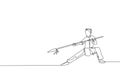 One continuous line drawing of young wushu master woman kung fu warrior in kimono with spear on training. Martial art sport Royalty Free Stock Photo