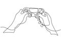 One continuous single line drawing of hands with joystick. Video game consoles developed by Microsoft hand-drawn picture