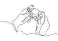One continuous single line drawing of hands with joystick. Video game consoles developed by Microsoft hand-drawn picture silhouett