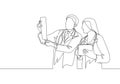 One continuous single line drawing of young male and female doctor discussing and diagnosing patient x-ray photo result together