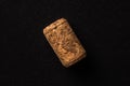 One cork stopper for wine bottle over black background Royalty Free Stock Photo