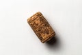 One cork stopper for wine bottle over white background Royalty Free Stock Photo