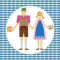 One couple in typical national costumes at the Oktoberfest