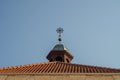 One of the crosses on the roof tower of Pazaislis Monastery in Kaunas