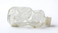 One crumpled plastic bottle isolated on white Royalty Free Stock Photo
