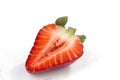 One cut in halfs strawberry on white Royalty Free Stock Photo