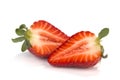 One cut in halfs strawberry on white Royalty Free Stock Photo