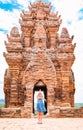 One dancing little girl on Poklongarai champa tower. Yoga position. Located in Phan Rang city, to the south of Nha Trang Royalty Free Stock Photo