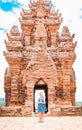 One dancing little girl on Poklongarai champa tower. Yoga position. Located in Phan Rang city, to the south of Nha Trang Royalty Free Stock Photo