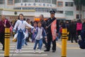 One day after school, students go out of the school gate Royalty Free Stock Photo