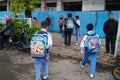 One day after school, students go out of the school gate Royalty Free Stock Photo