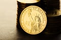 Dollar coin and gold money on the desk Royalty Free Stock Photo