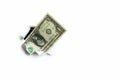 One dollar sticking out of a hole on a white background, incomplete income. Royalty Free Stock Photo