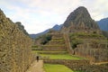 One early-bird visitor exploring Machu Picchu Incas citadel at dawn, Cusco, Peru Royalty Free Stock Photo