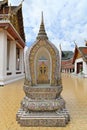 One of the eight cardinal boundary or sima sema stones surrounding the ordination hall at Wat Saket, a Buddhist temple, Bangkok