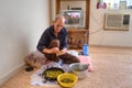 One elderly iranian men cooking persian dishes stuffed grape l