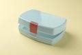 One empty lunch box on beige background Royalty Free Stock Photo