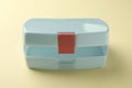 One empty lunch box on beige background Royalty Free Stock Photo
