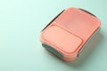 One empty lunch box on light blue background, space for text Royalty Free Stock Photo