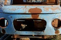 Empty old blue rusty car cabin on the street Royalty Free Stock Photo