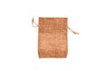 One empty peach fuzz colored cotton fabric bag (beige burlap pouch) isolated on white background. Copy space for text. Royalty Free Stock Photo