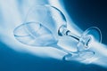 One empty wineglass on a blue background Royalty Free Stock Photo