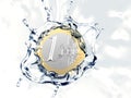 One euro coin is falling into water