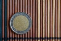 One euro coin lie on wooden bamboo table Denomination is two euro - back side Royalty Free Stock Photo