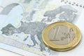 One euro coin over Europe map Royalty Free Stock Photo