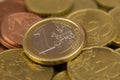 One euro coin on pile of euro coins macro Royalty Free Stock Photo