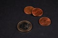 One euro coin and two cent on a dark background. Royalty Free Stock Photo