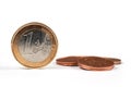 One Euro coin on white background, with many coins Royalty Free Stock Photo