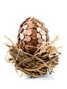 One eurocent egg in bird's nest Royalty Free Stock Photo