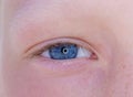 One eye of a teenager macro close-up Royalty Free Stock Photo