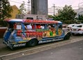 One of the famous Jeepneys on a busy main street in Quezon City, philippines