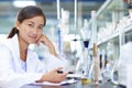 Asian Laboratory scientist working at lab with test tubes Royalty Free Stock Photo