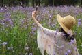 One Female Taking Selfie Picture in the Murdannia Flower Field with Her Mobile Smart Phone Royalty Free Stock Photo