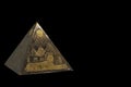 Figurine of bronze egyptian pyramid