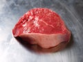 One fillet steak on a metal tray. Butcher craft product. High quality fresh beef. Meat industry