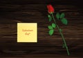 One flower with red bow and Yellow sheet of paper for notes. Sti