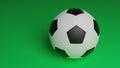 One football ball isolated on green background, close up soccer ball with copy space for sport background.