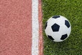 The one football is near the line on the stadium. Royalty Free Stock Photo