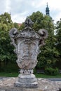 One of the four large stone vases on the walls of the cemetery in the village Strilky