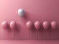 One freedom white balloon flying away from other pink balloons Royalty Free Stock Photo