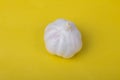 One fresh garlic on a yellow background Royalty Free Stock Photo