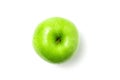 One fresh green apple with water drops on white background, top view Royalty Free Stock Photo