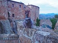 A cat sits on the wall of the Fortress of Orsini in Sorano, Italy Royalty Free Stock Photo