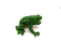 one frog toy made of plastic on a white background. Royalty Free Stock Photo